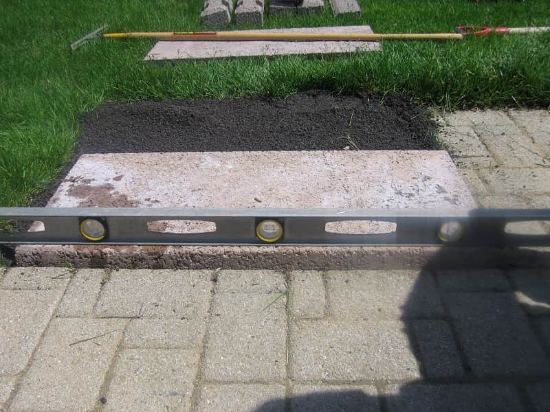 mettre à niveau les bases du foyer sur la poussière de pierre