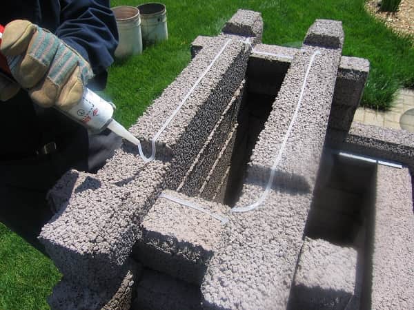 put silicone in the chimney during the assembly of the fireplace